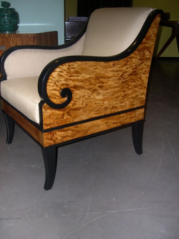 Swedish neo-classical single bergere in golden flame birch wood with ebonized birch detailing.