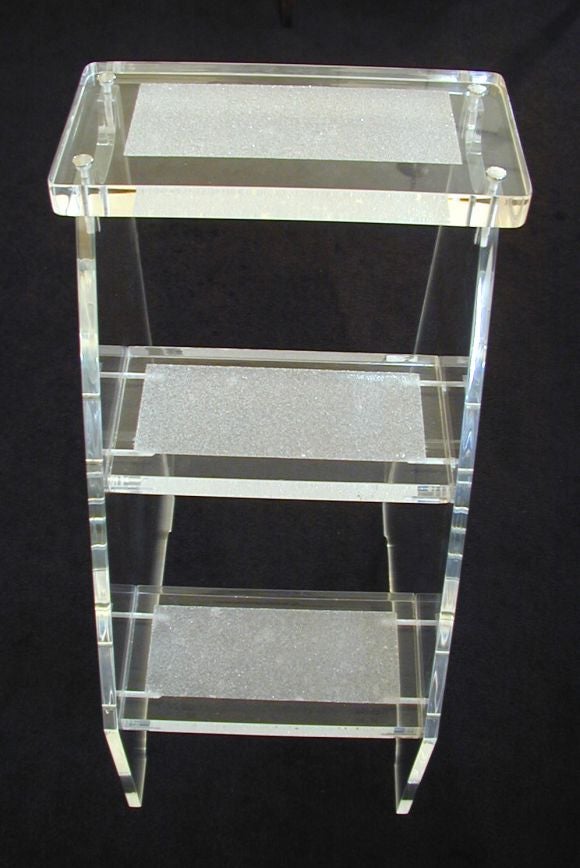 The “Social Climber” Lucite step stool features non-skid treads and polished chrome hardware. Perfect for the closet that has everything or anywhere else you need to be a step above.
