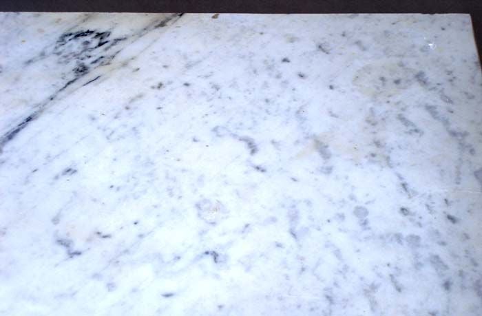 Antique bistro table with marble top and iron base. Original white paint. Beautiful patina throughout.
