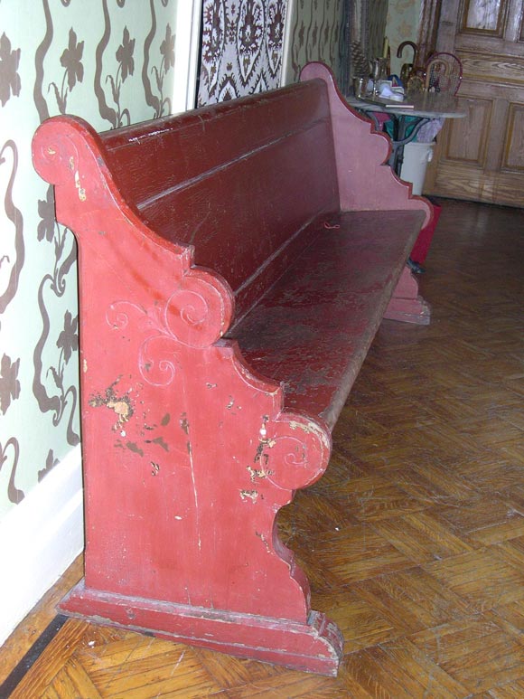 A 19th century red-painted bench