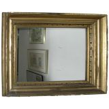 A gilt-wood rectangular mirror