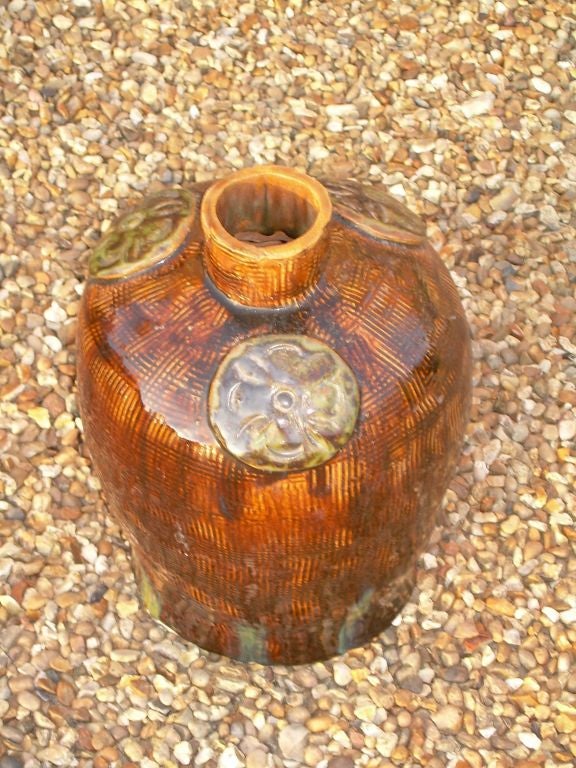 English Early 20th c. Arts & Crafts Embossed Treacle Glazed Pot