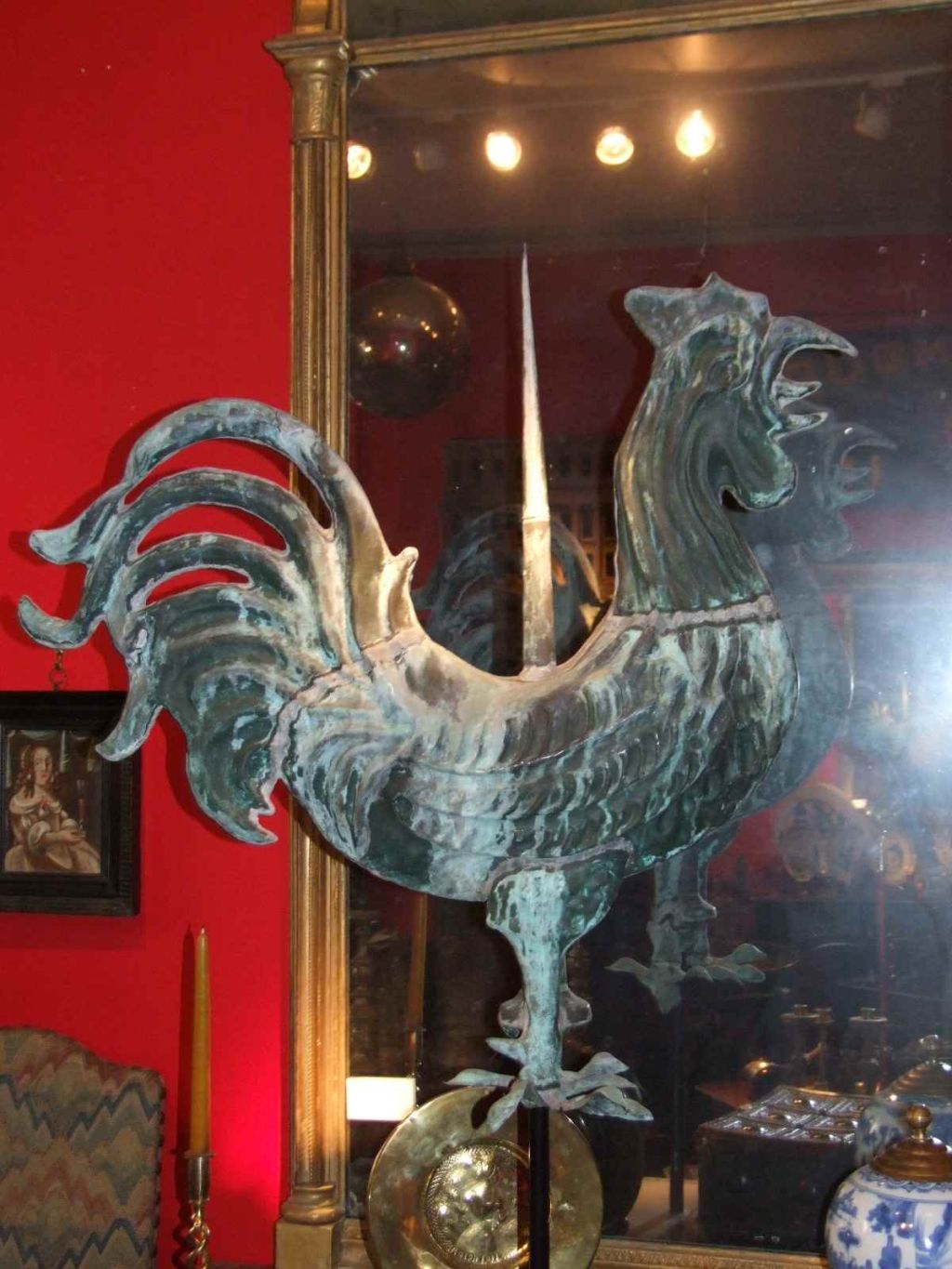 Wonderful and rare full bodied copper rooster weathervane of impressive scale and in a beautiful weathered surface, now on a contemporary stand, the head, body, feet and tail with hand hammered detail. <br />
<br />
Provenance: Grosse Pointe,