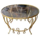 Whimsical gilt-iron, glass-top coffee table