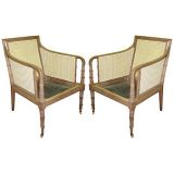 Vintage A  pair Regency-style caned armchairs on castors