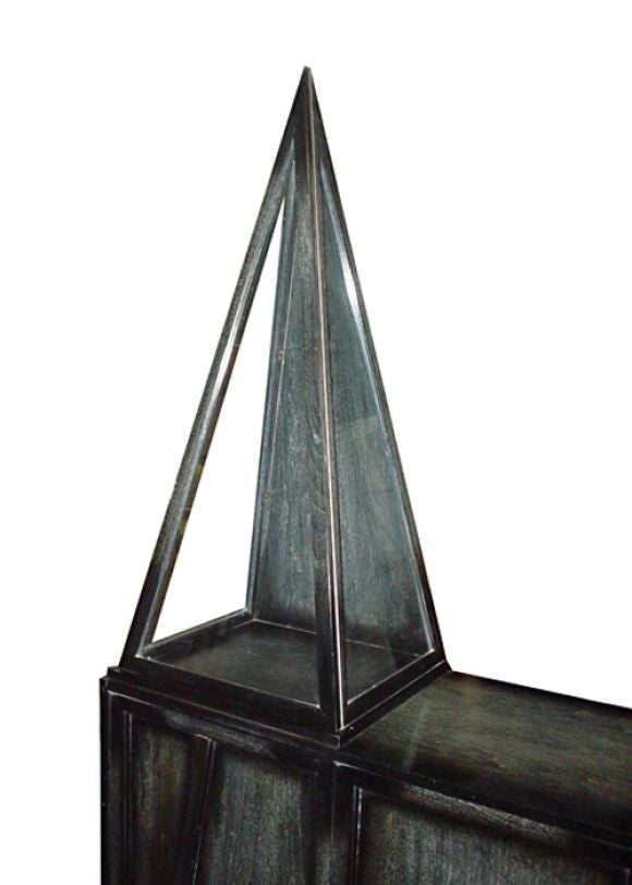 Highly unusual ebonized, limed oak sideboard, featuring pyramidical etageres