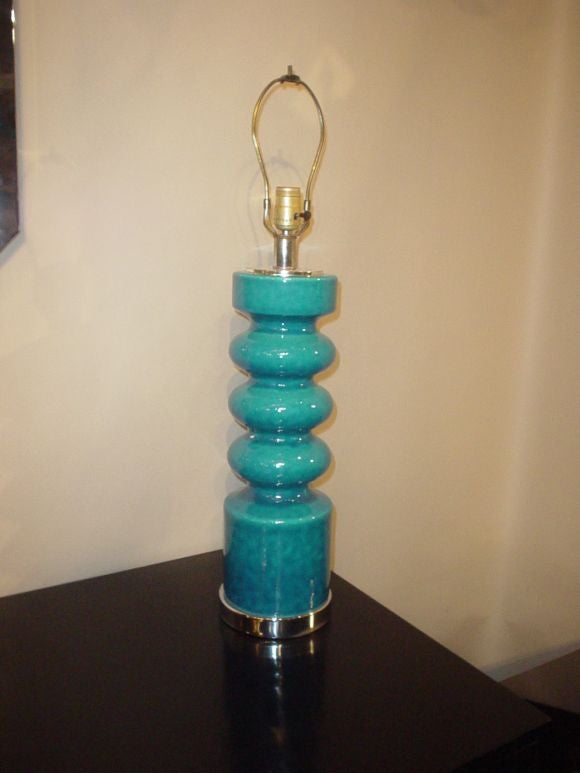 A great pair of turquoise, cylindrical lamps