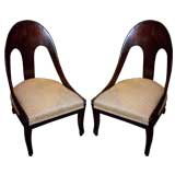 A Pair of Oversized Mahogany Spoonback Chairs