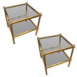 A Pair Brass Two-Tiered end tables in the neo-classic manner