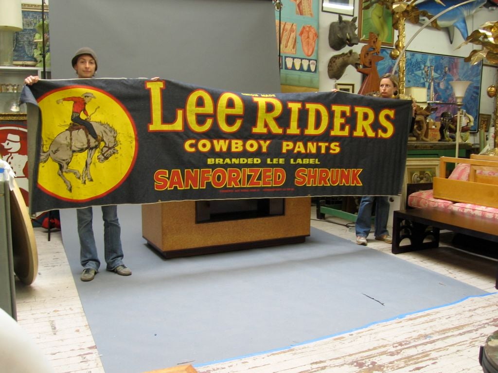 Hey urban cowboys! Saddle up to this perfect object to compliment that mechanical bull in your living room. Vintage advertisement from Lee Rider denim jeans, circa 1950. Quite rare point of purchase display with very nice graphics.