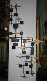 Wall sculpture in the style of Curtis Jere