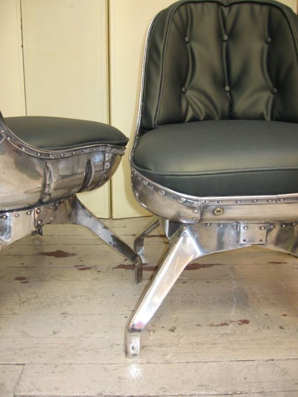WWII aluminum machine age esthetic.  Expertly restored.  Price listed is for one chair.