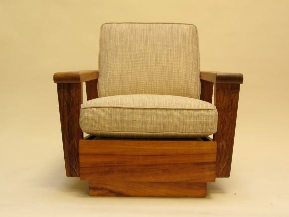 This solid koa wood set was allegedly made by Hawaiian prison labor during the 1940's.  Koa wood has not been permitted to be cut for several decades.  Arms of the seating feature a hand carved tropical foliage motif.  The two side tables and coffee