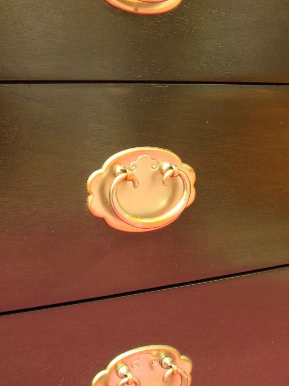 High quaility manufacturing, probably Baker, nice detailing (such as silver wash on brass handles)