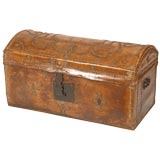Antique Leather trunk with brass nail decorative pattern.