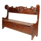 Country Brazilian settle with locking seat storage.