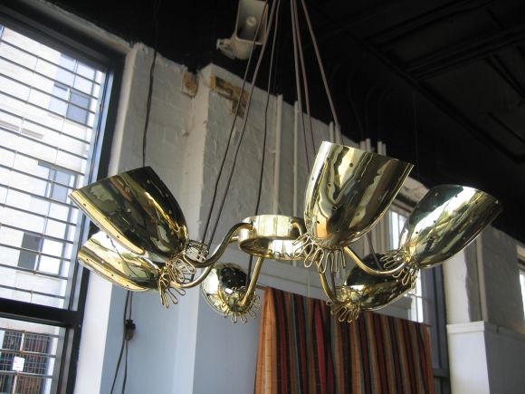 6-arm solid brass chandelier which employs colored silk lamp-cord as structual support.  Although unsigned, the various design elements and the high quality of the construction strongly suggest Paavo Tynell.