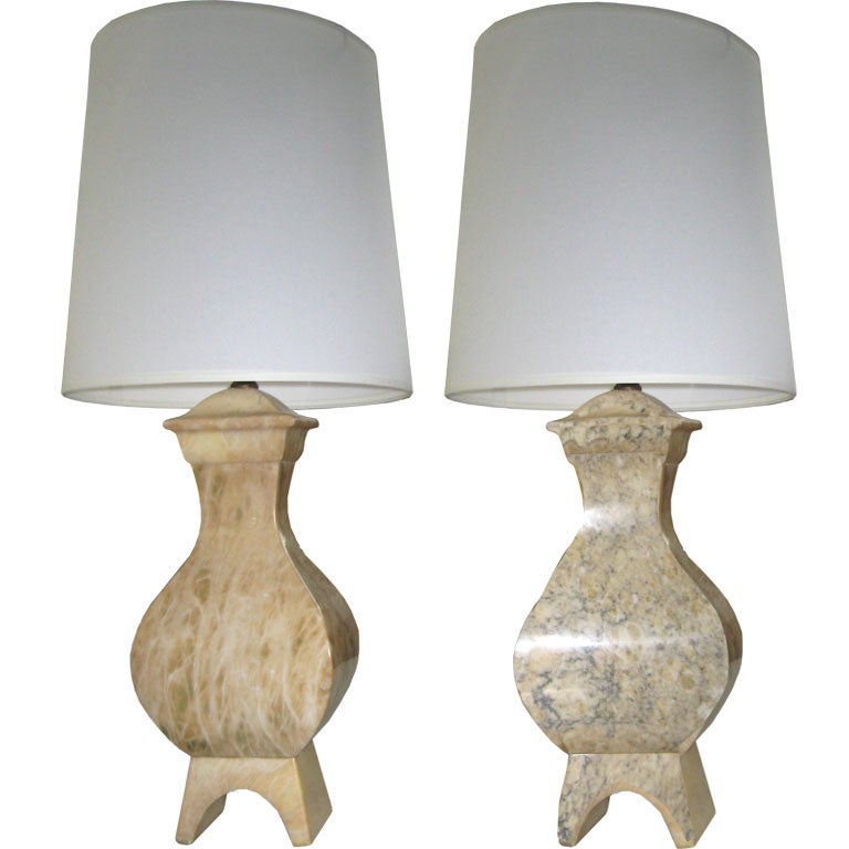Sculptural pair of carved marble lamps. 