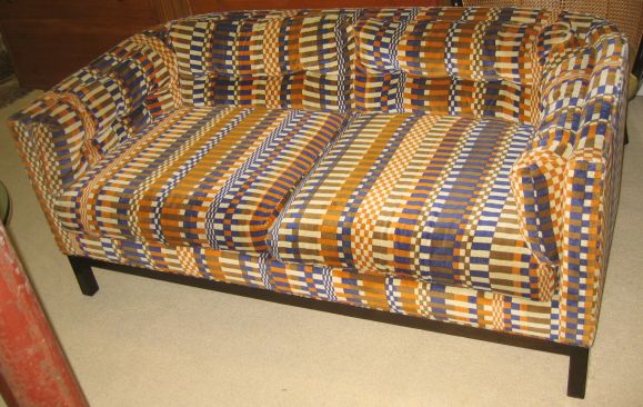Groovy little Edward Wormley designed settee with rounded edges, floating back, sewn-in tufted cushions, and amazing Josef Albers-esque Boris Kroll fabric. Down-filled back cushions and mahogany frame. Signed in the decking and with dated label that