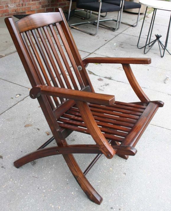 Pair authentic steamship mahogany folding chairs with wide seats.