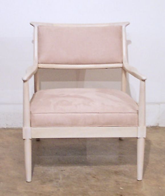 A pair of Tommi Parzinger designed bleached teak chairs, very deep and comfortable.
