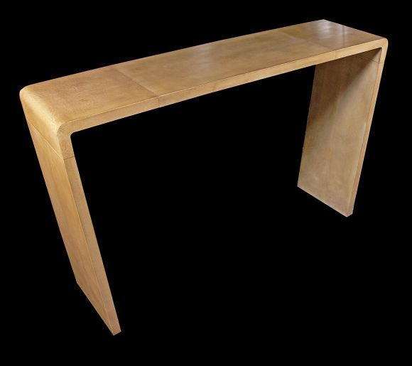 Signed by Ludwig and Dominique / Paris after a Jean-Michel Frank design.<br />
<br />
Console table is convered in squares of rich natural vellum, legs angle inward, excellent proportion.