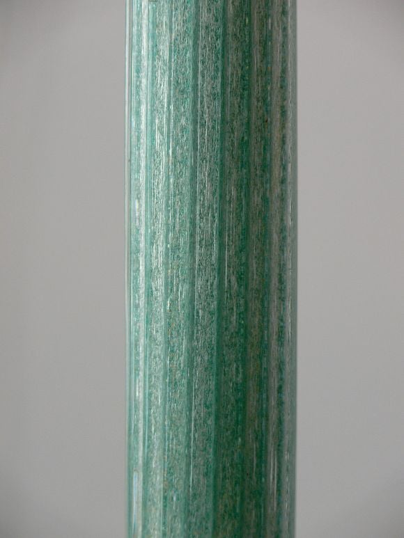 Spectacular glass floor lamp by Carlo Scarpa for Venini, 1935. Elegantly tapered column of aquamarine sommerso glass. Brass base and fittings. Signed with manufacturers mark, "Venini Murano". A fantastic early example from Scarpa. Similar