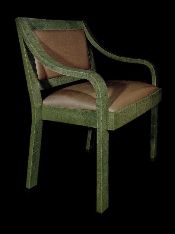 Classic regency chair by Karl Springer. Frame entirely covered in beautiful green shagreen. Back and seat upholstered in ivory silk. Brass sabots finish the legs.