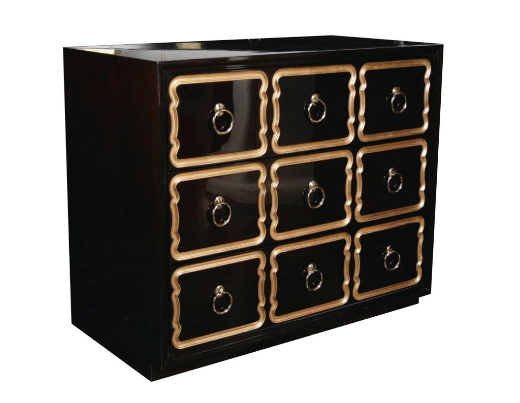 A fantastic trio of chests by Dorothy Draper for Heritage’s España Collection.  Each has three drawers with three brass ring drawer pulls that are framed by deep-carved gilded accents.  With finished backs in ebony stain and high polish lacquer,
