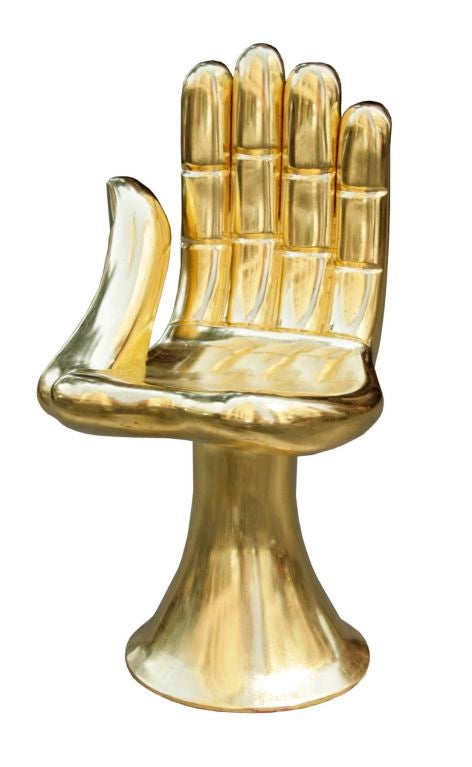 A gilt hand chair sculpture by Pedro Friedeberg, c. 1970.  Hand carved gilt mahogany beautifully burnished to reveal traditional red bole undercoat. Signed underside of base 