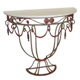 An Art Deco Polychromed Wrought Iron Console