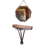 An Art Deco Patinated Wrought Iron Console and Mirror
