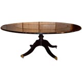 A Regency Style Black Lacquer Dining Table
