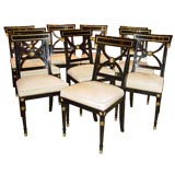 A Set of Ten French 40's Parcel-Gilt Black Lacquer Dining Chairs