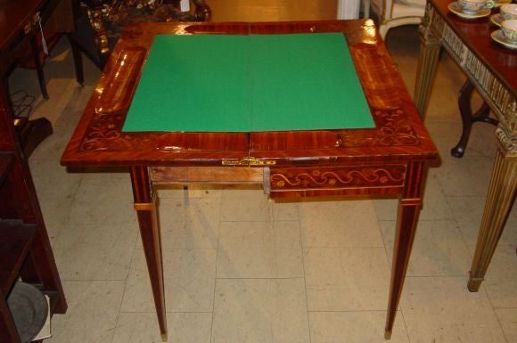 A Russian Neo-Classic Kingwood and Marquetry Games Table