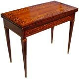 A Russian Neo-Classic Kingwood and Marquetry Games Table