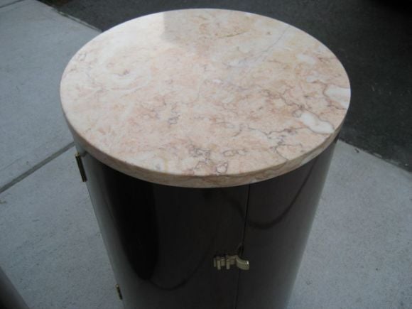 A Pair of Unusual Rounded Bedside Tables