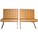 A pair of Knoll Barcelona Chairs