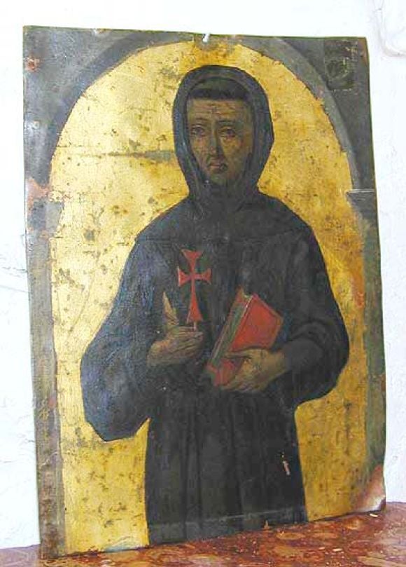 Pair of 16th century Spanish oil paintings with gold wash on copper of St. Francis and an unidentified female saint