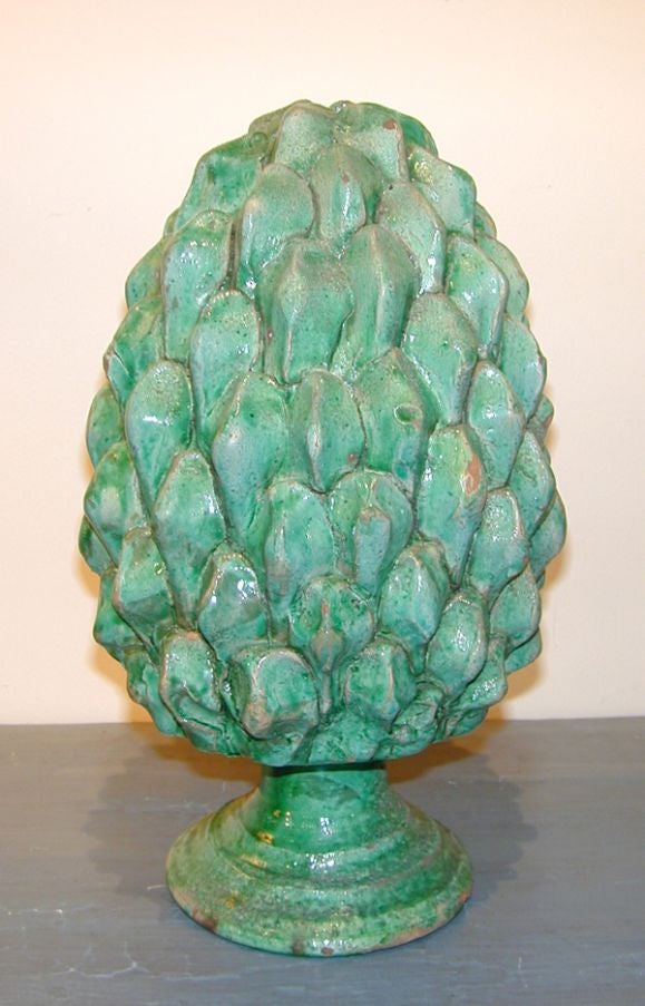 Beautiful pair of late 18th early 19th c Italian maiolica green glazed pinecones.These are meant to stand alone as decorative objects.Great faded green color.