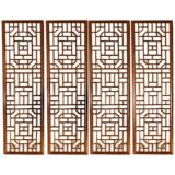 A Set Of Four Window Panels With Lattice Fret Work