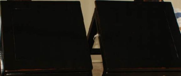 A Pair Of Black Lacquer Square Pedestals