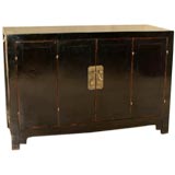Black Lacquer Sideboard With A Pair Of Bifold Doors