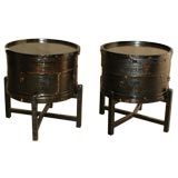 A Pair Of Black Lacquer Round 2-Tier Canisers On Stands