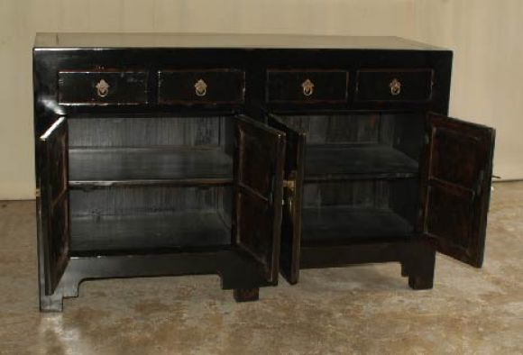 A very refined and elegant black lacquer sideboard, four drawers on top of two pairs of doors, brass fitting. View our website at: www.greenwichorientalantiques.com for additional 