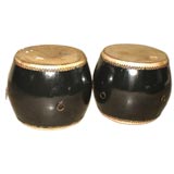 A Pair Of Black Lacquer Drums With Leather Top & Bottom