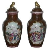 A Pair Of Porcelain Baluster Jars With Covers