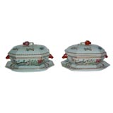 A Pair Of Porcelain Tureens With Matching Dishes