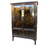 A Black Lacquer Armoire With Gold Gilt Motif