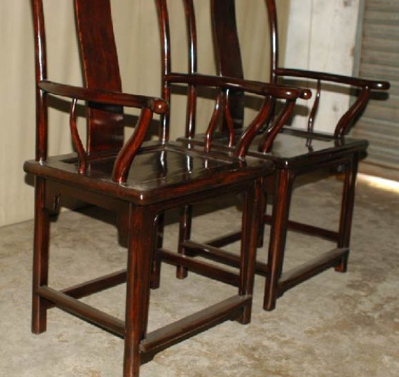 A pair of very refined and elegant yoke back armchairs. View our website at: www.greenwichorientalantiques.com for additional chair selections.